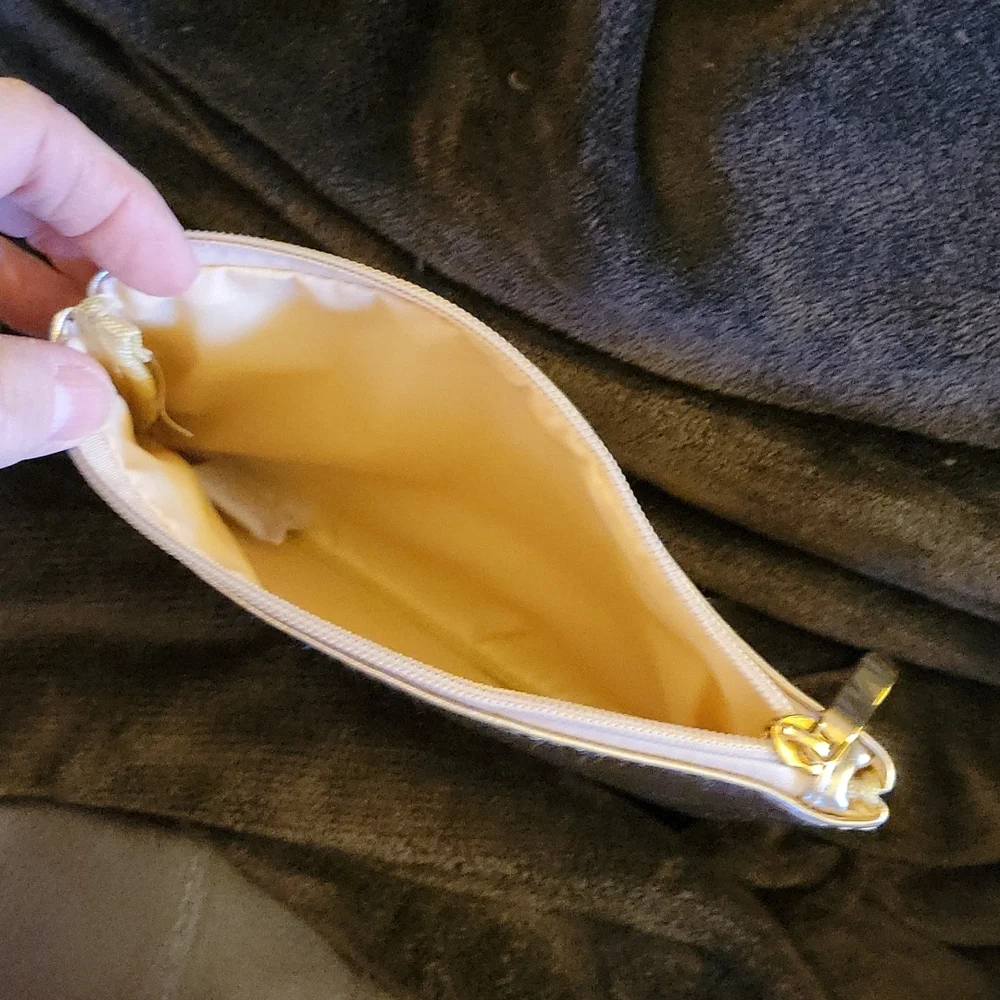 Cosmetic bag metallic gold KEEP THEM REMEMBERING EVEN AFTER YOU'VE WALKED AWAY